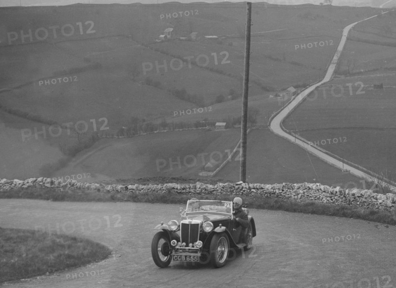 MG TA of WC Reid competing in the RAC Rally, 1939. Artist: Bill Brunell.
