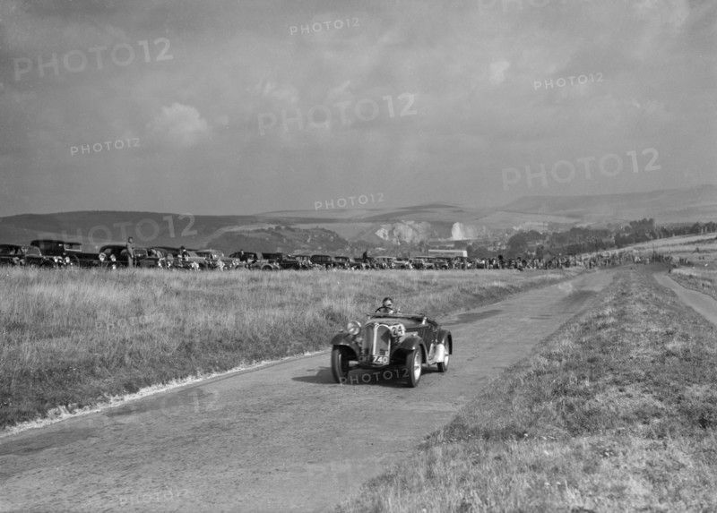 Frazer-Nash BMW competing in the Bugatti Owners Club Lewes Speed Trials, Sussex, 1937. Artist: Bill Brunell.