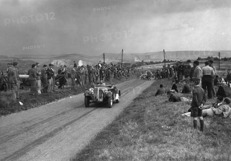 Frazer-Nash BMW competing in the Bugatti Owners Club Lewes Speed Trials, Sussex, 1937. Artist: Bill Brunell.