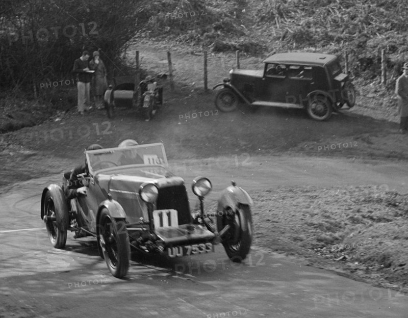 Aston Martin open sports competing in the JCC Half-Day Trial, 1930. Artist: Bill Brunell.