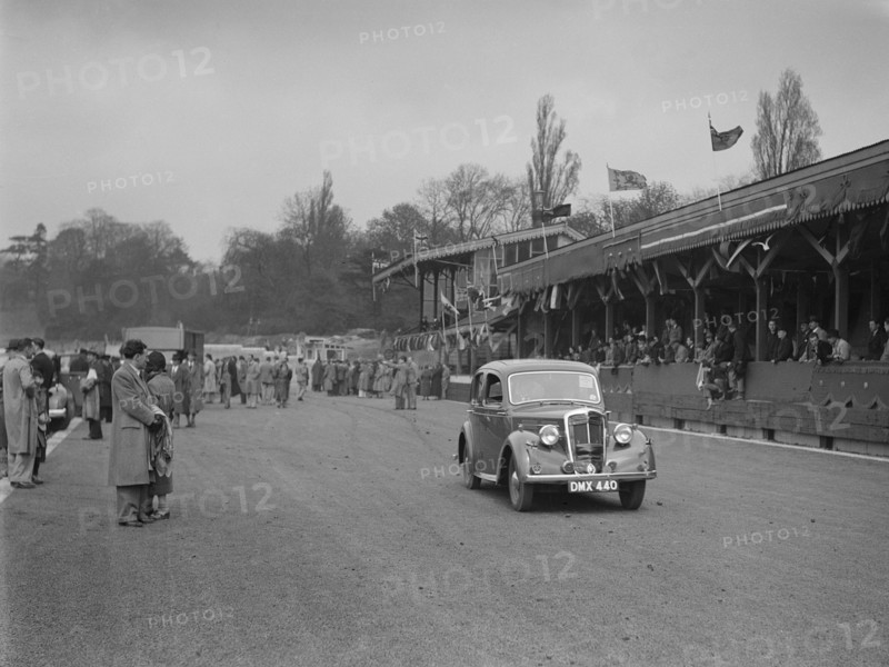 Standard saloon at a race meeting at Crystal Palace, London, 1939. Artist: Bill Brunell.