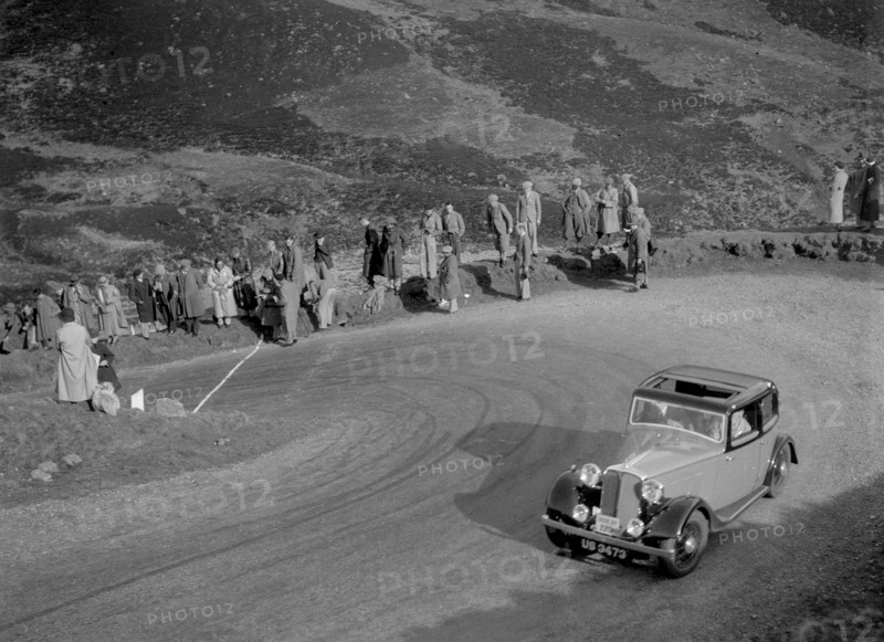 Rover 4-door saloon of WA Gilmour at the RSAC Scottish Rally, Devil's Elbow, Glenshee, 1934. Artist: Bill Brunell.
