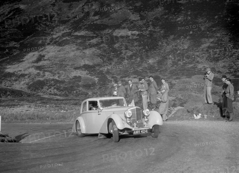 Bentley Airline saloon of Miss JM Nicholson, RSAC Scottish Rally, Devil's Elbow, Glenshee, 1934. Artist: Bill Brunell.