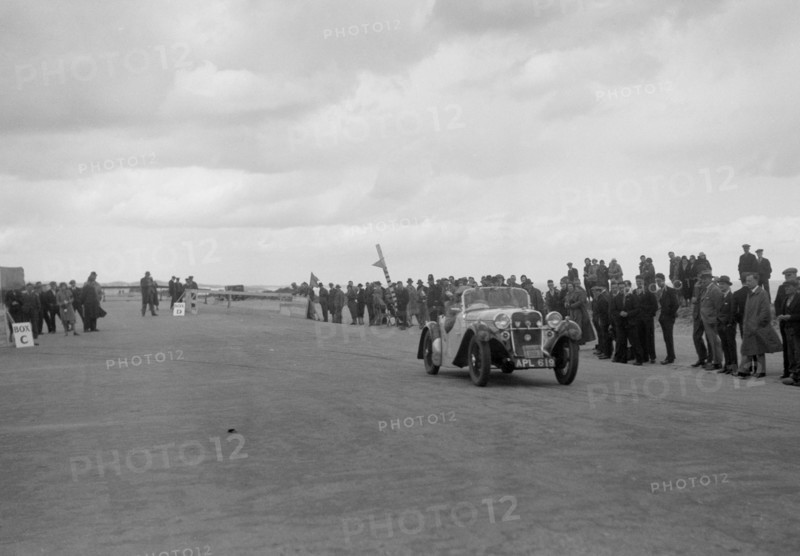 Singer open sports competing in the RSAC Scottish Rally, 1934. Artist: Bill Brunell.
