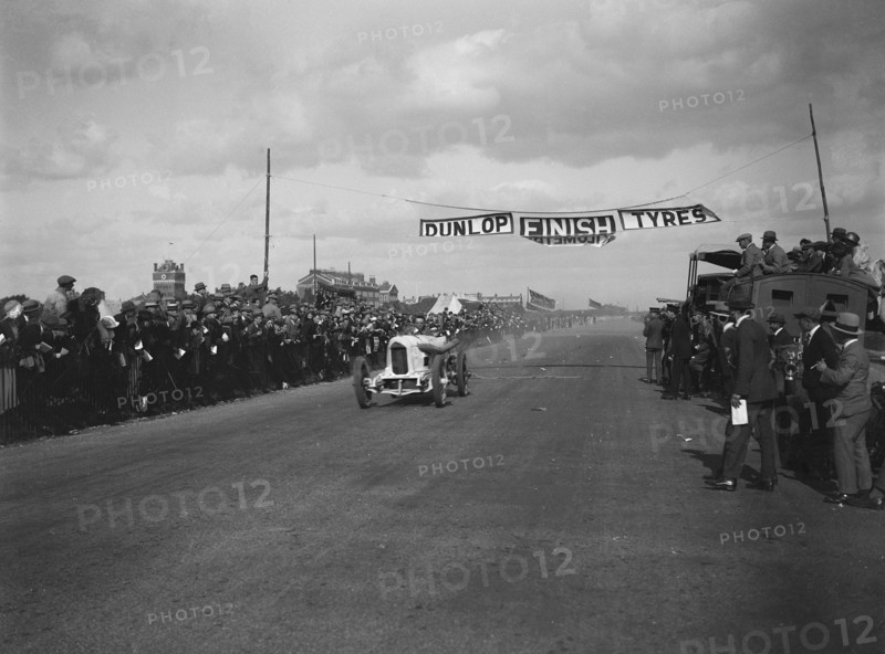 A Barlow's Benz 84hp at the finishing line, Southsea Speed Carnival, Hampshire, 1922. Artist: Bill Brunell.