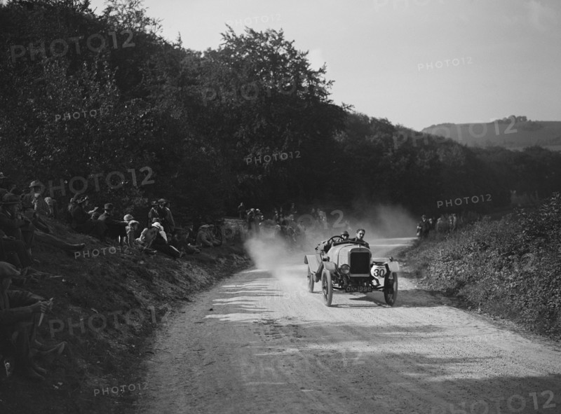 McKenzie of WF Knight competing in a JCC hillclimb, South Harting, Sussex, 1922. Artist: Bill Brunell.