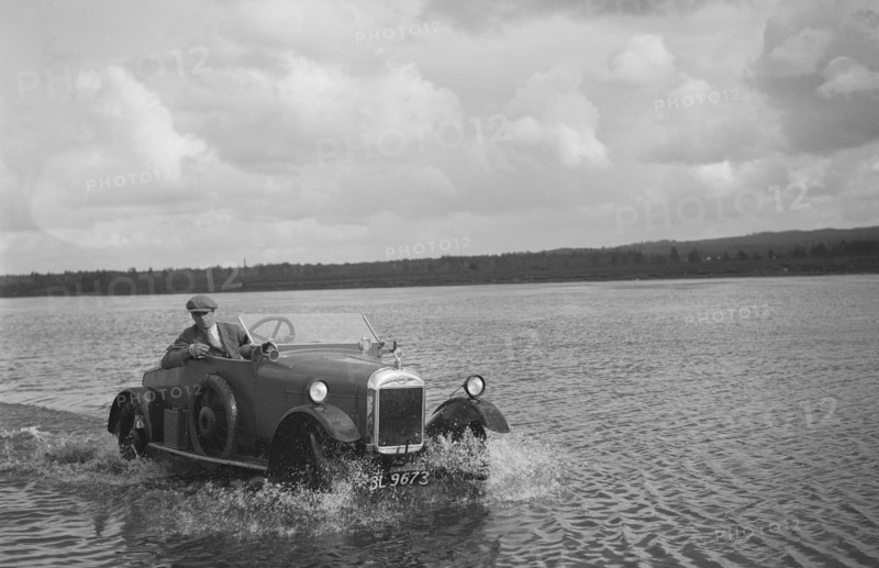 HG Pope driving a GWK through water at a demonstration event, Frensham Common Pond, Surrey, 1922. Artist: Bill Brunell.