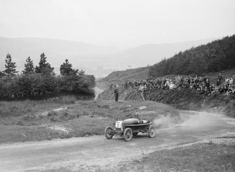 Aston Martin Bunny of Frank B Halford competing in the Caerphilly Hillclimb, Wales, 1923. Artist: Bill Brunell.