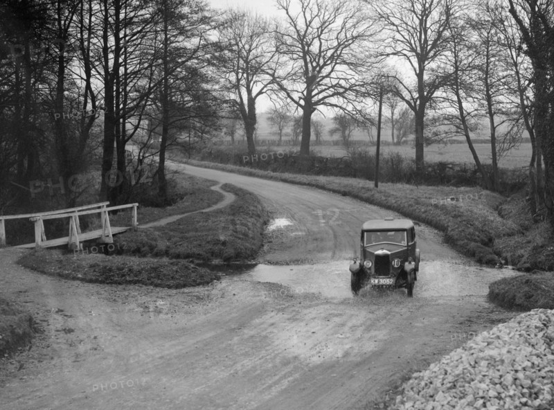 Riley 9 of HC Holm competing in the Ilkley & District Motor Club Trial, Yorkshire, 1930s. Artist: Bill Brunell.