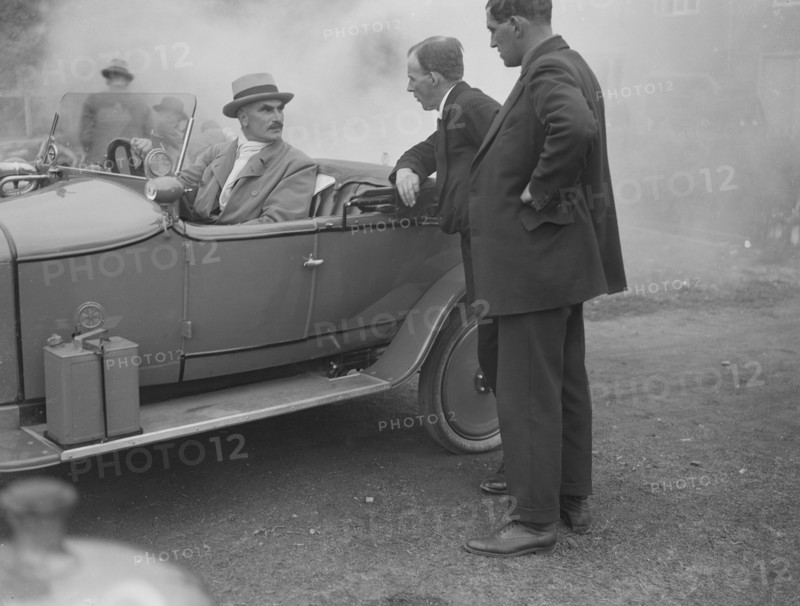 Selwyn Edge in an AC open 2-seater, Brooklands, Surrey, c1921. Artist: Bill Brunell.