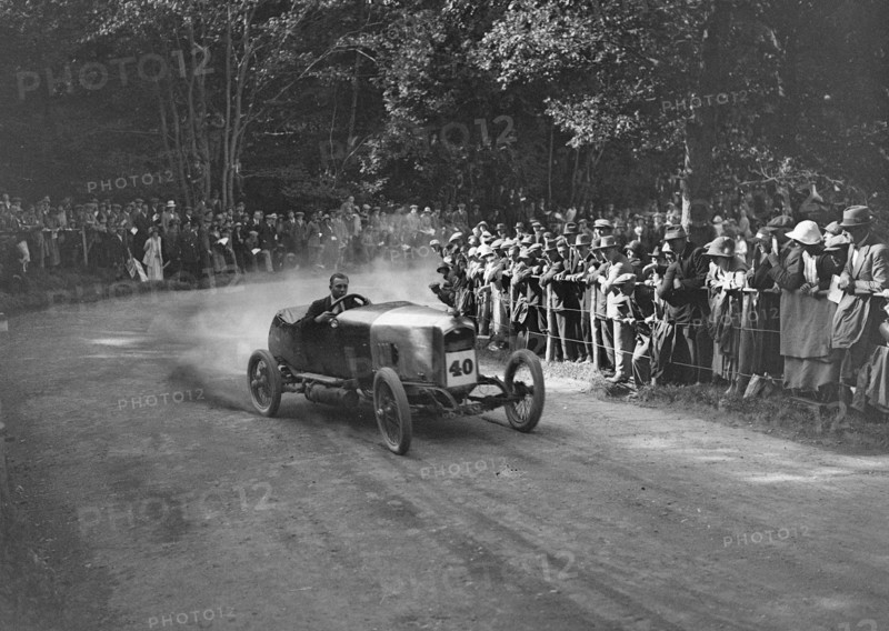 Unidentified open 4-seater competing in the MAC Shelsley Walsh Hillclimb, Worcestershire, 1923. Artist: Bill Brunell.