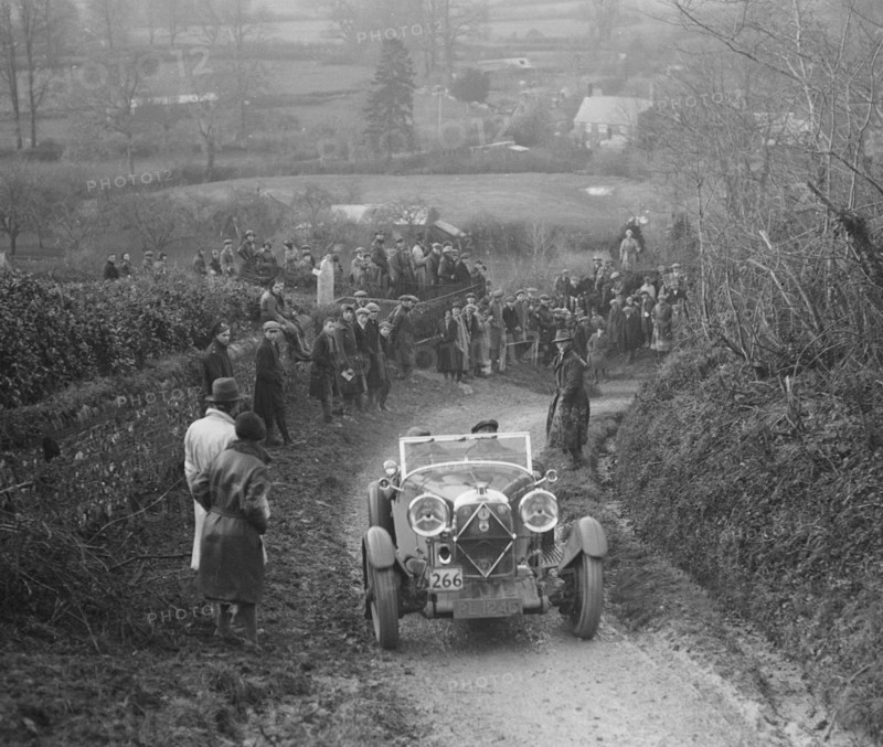 Lagonda of WM Couper performing a braking test, MCC Exeter Trial, Ibberton Hill, Dorset, 1930. Artist: Bill Brunell.