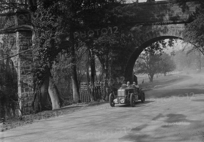 MG Midget of Eddie Hall at Starkey's Bridge, Donington Park, Leicestershire, 1933. Artist: Bill Brunell.