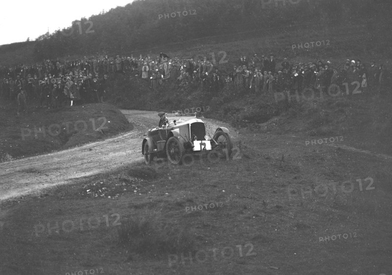 Vauxhall 30-98 of Humphrey Cook competing in the Caerphilly Hillclimb, Wales, 1922. Artist: Bill Brunell.