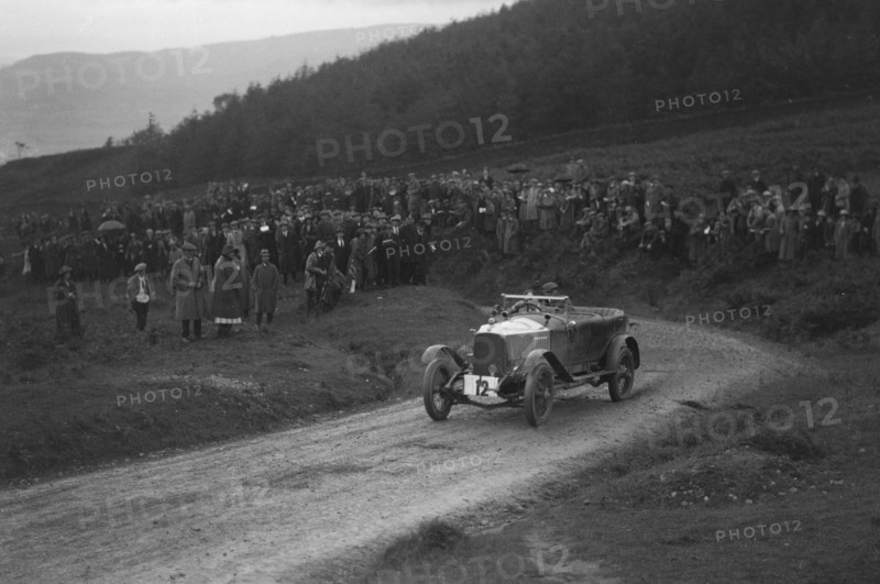 Vauxhall 30-98 of Humphrey Cook competing in the Caerphilly Hillclimb, Wales, 1922. Artist: Bill Brunell.