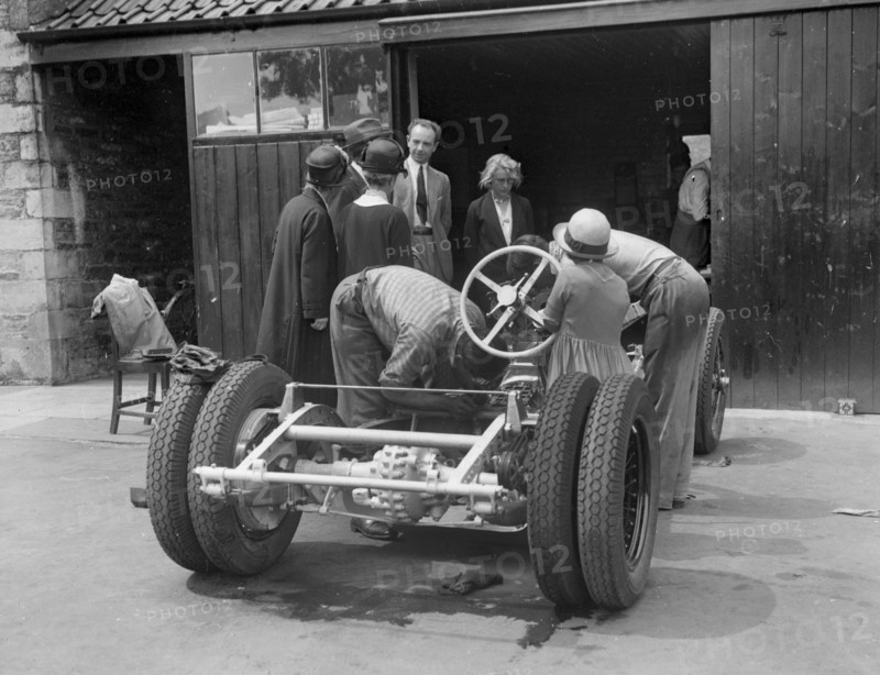 Working on Raymond Mays' Vauxhall-Villiers, c1930s. Artist: Bill Brunell.