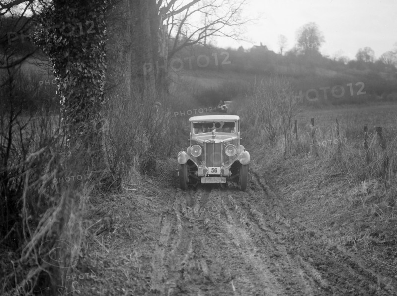 MG 18/80 saloon of R Gough competing in the MG Car Club Trial, Kimble Lane, Chilterns, 1931. Artist: Bill Brunell.
