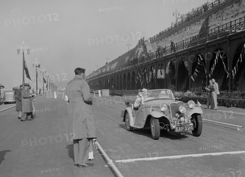 Singer Nine sports of CE Cole at the RAC Rally, Madeira Drive, Brighton, 1939. Artist: Bill Brunell.