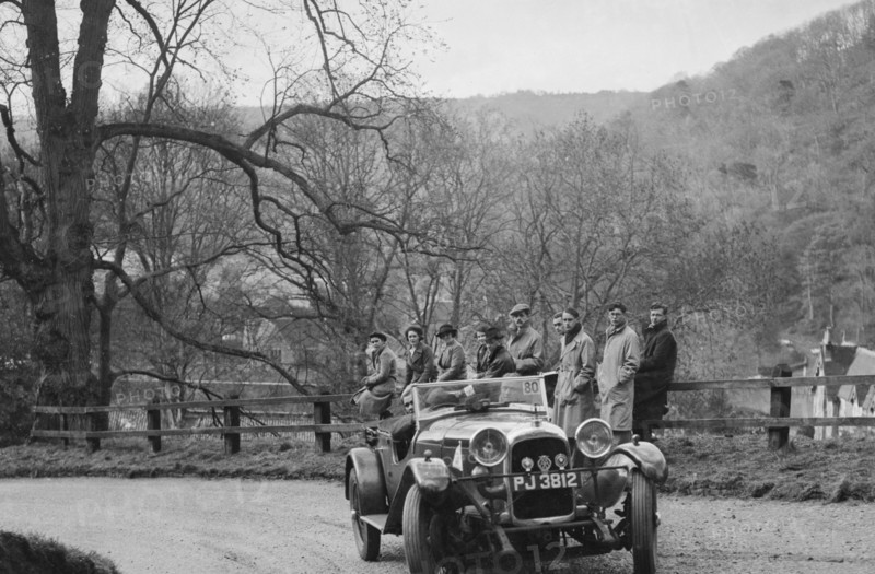 Lagonda 4-seat tourer of CE Littler competing in the RAC Rally, 1939. Artist: Bill Brunell.