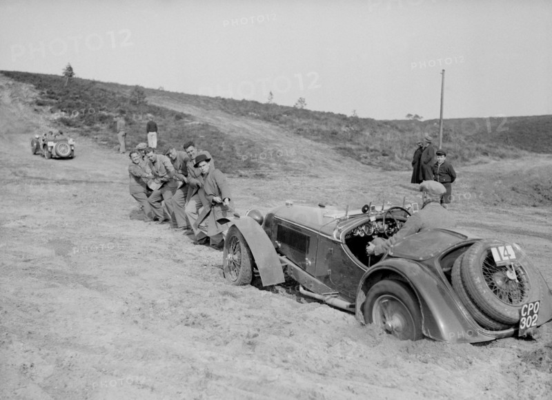 Riley Birdcage Sprite competing in the Great Weat Motor Club Trial, 1938. Artist: Bill Brunell.