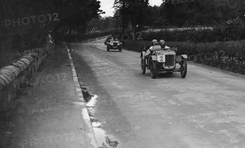 Austin Ulsters of SV Holbrook and Archie Frazer-Nash, RAC TT Race, Ards Circuit, Belfast, 1929 Artist: Bill Brunell.
