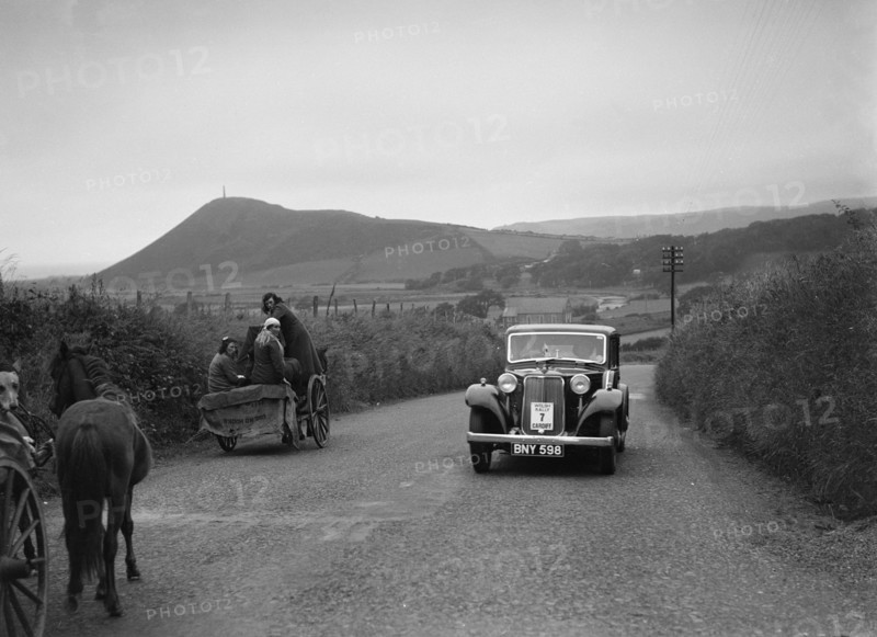 Armstrong-Siddeley saloon of FN Morgan competing in the South Wales Auto Club Welsh Rally, 1937 Artist: Bill Brunell.