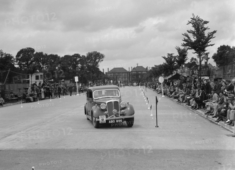 Rover saloon of DB Morgan competing in the South Wales Auto Club Welsh Rally, 1937 Artist: Bill Brunell.