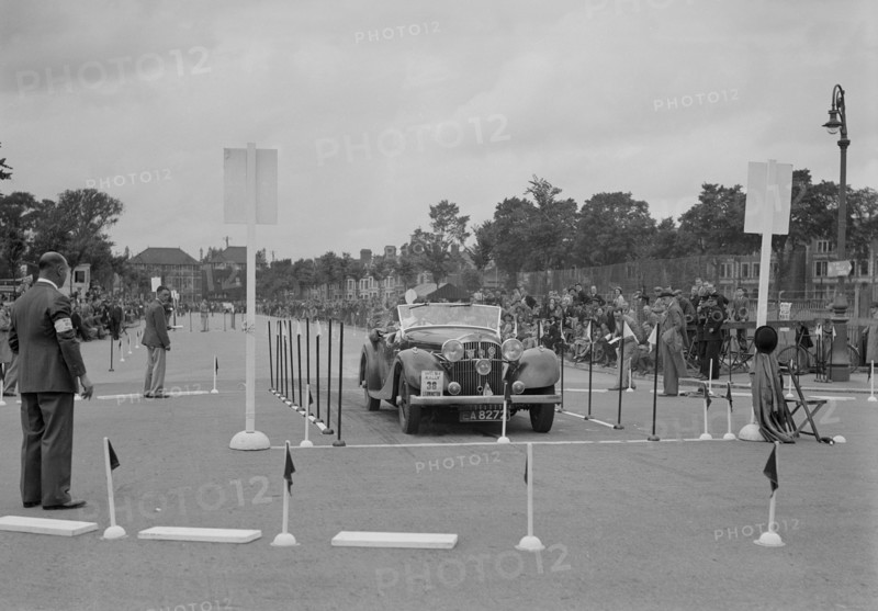 Jensen open 4-seater of Ken Crawford competing in the South Wales Auto Club Welsh Rally, 1937 Artist: Bill Brunell.