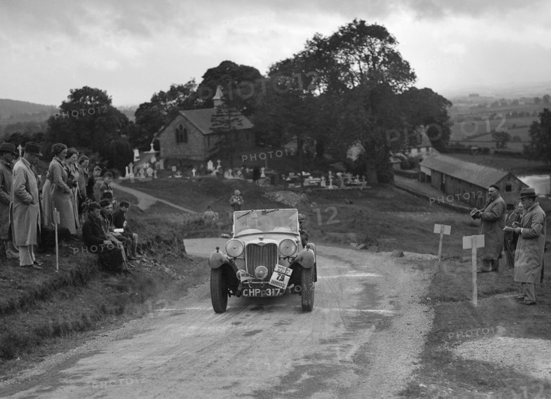 Singer B37 1.5 litre sports of WC Butler competing in the South Wales Auto Club Welsh Rally, 1937 Artist: Bill Brunell.