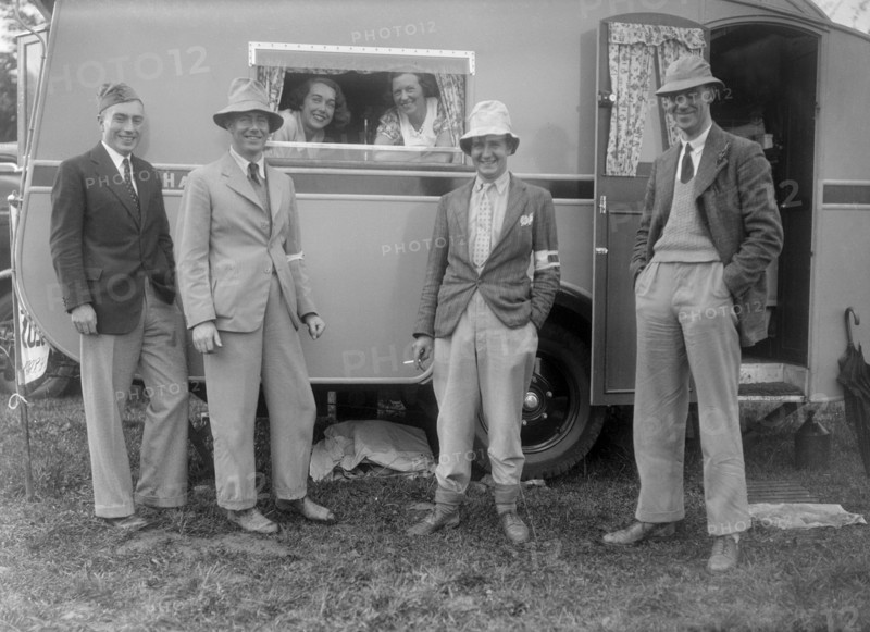 Group portrat at Shelsley Walsh, Worcestershire, during the Blackpool Rally, 1937.  Artist: Bill Brunell.