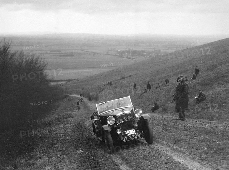 Morris Minor 2-seater competing in a trial, Crowell Hill, Chinnor, Oxfordshire, 1930s. Artist: Bill Brunell.