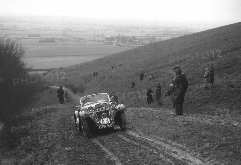 Singer Le Mans competing in a trial, Crowell Hill, Chinnor, Oxfordshire, 1930s. Artist: Bill Brunell.