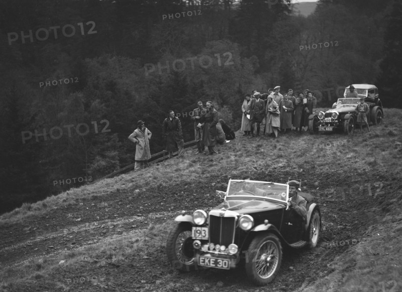 MG TA of JN Goodwin competing in the MCC Edinburgh Trial, Roxburghshire, Scotland, 1938. Artist: Bill Brunell.