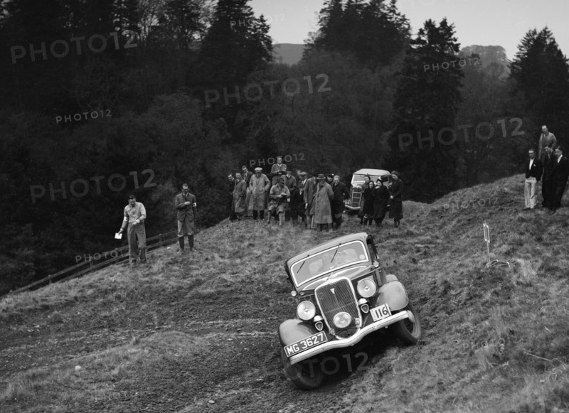 Ford V8 of DG Silcock competing in the MCC Edinburgh Trial, Roxburghshire, Scotland, 1938. Artist: Bill Brunell.
