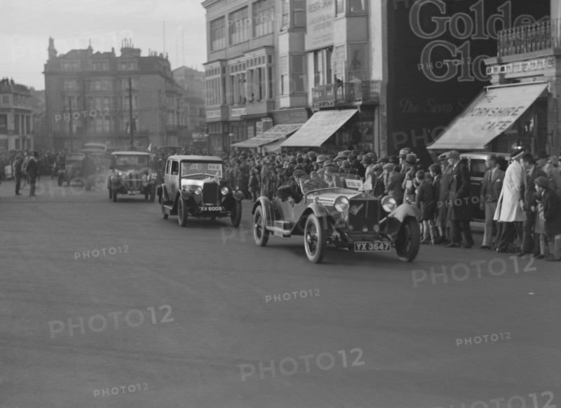 Alfa Romeo and Riley taking part in the London-Brighton Run, 1928. Artist: Bill Brunell.