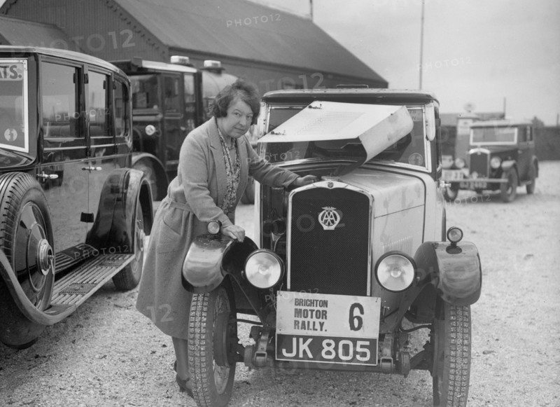 Mrs JW McClintock with her Triumph saloon at the B&HMC Brighton Motor Rally, 1930. Artist: Bill Brunell.