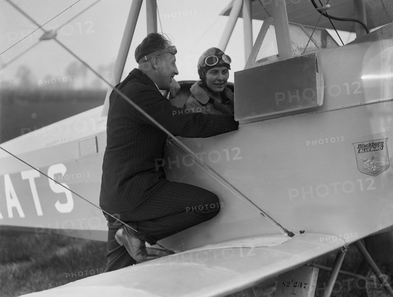 Kitty Brunell in the cockpit of a Blackburn Bluebird aeroplane, c1930s. Artist: Bill Brunell.