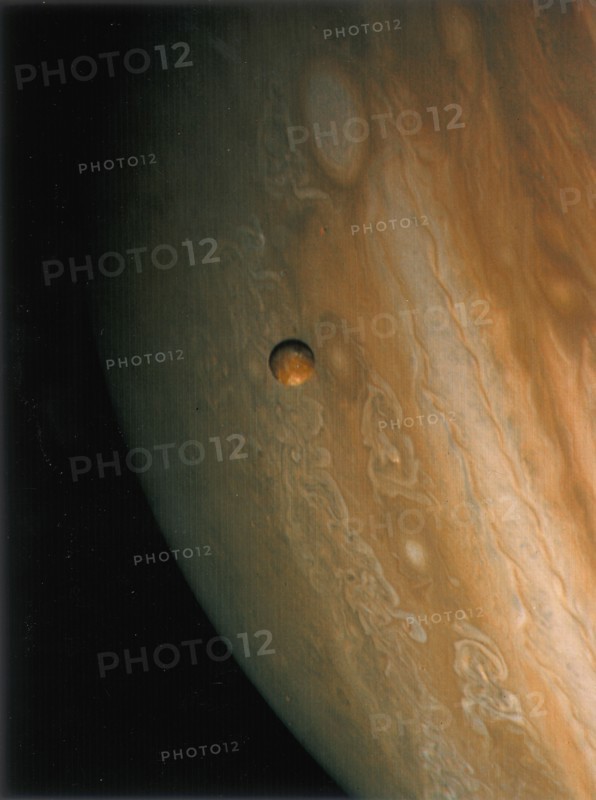 Jupiter and Io, one of its moons, 1979. Artist: Unknown