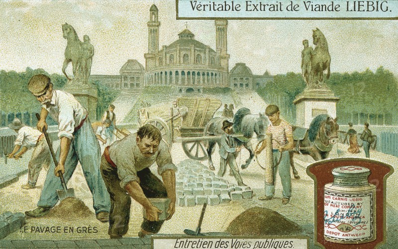 Surfacing a road with granite setts, Paris, c1900. Artist: Unknown
