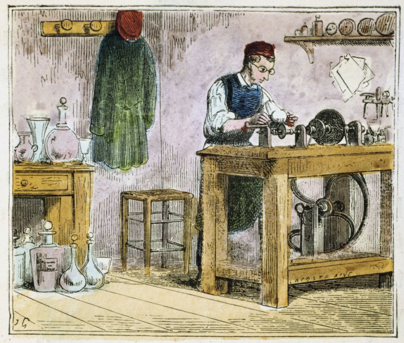 Glass cutter decorating table ware on a carborundum wheel, 1867. Artist: Unknown