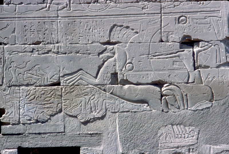 Detail of relief of Pharaoh in chariot riding down his enemies, Temple of Amun, Karnak, c1400 BC. Artist: Unknown