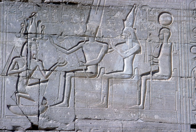 Relief of Rameses II kneeling before Amun Mut & Khons, The Ramesseum, Luxor, Egypt, c1250 BC. Artist: Unknown