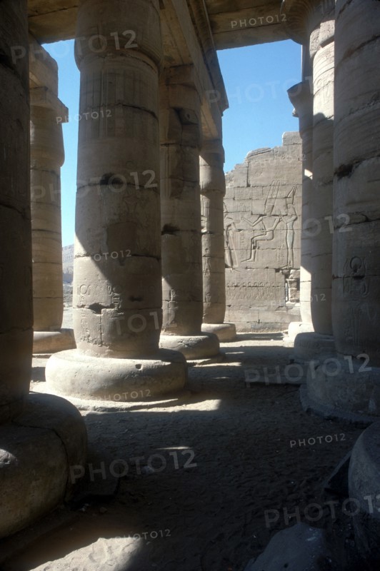 View through to relief of Rameses II before Amun & Mut, Temple of Rameses II, Luxor, Egypt. Artist: Unknown