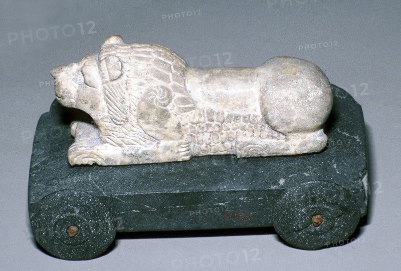 Limestone and bitumen lion mounted on a wheeled base, Susa, c12th century BC. Artist: Unknown