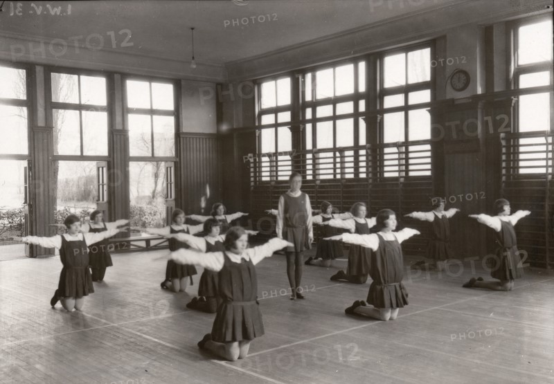 Rowntree girls in an indoor gymnastic class, 1930. Artist: Unknown
