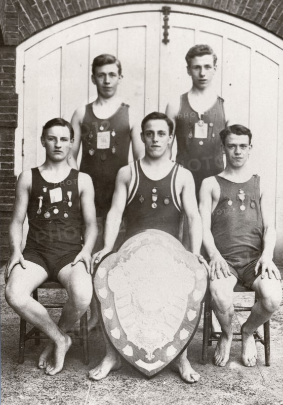Rowntree boys life-saving team pose with the Faber Life-Saving Trophy, 1912. Artist: Unknown