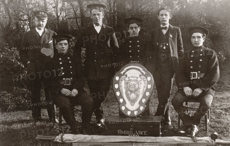Members of the winning Rowntree Ambulance Team pose with trophy, York, Yorkshire, 24 Jan 1914. Artist: Unknown