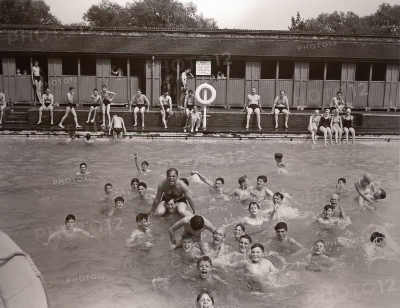 Children play in the swimming baths, York, Yorkshire, 1955. Artist: Unknown