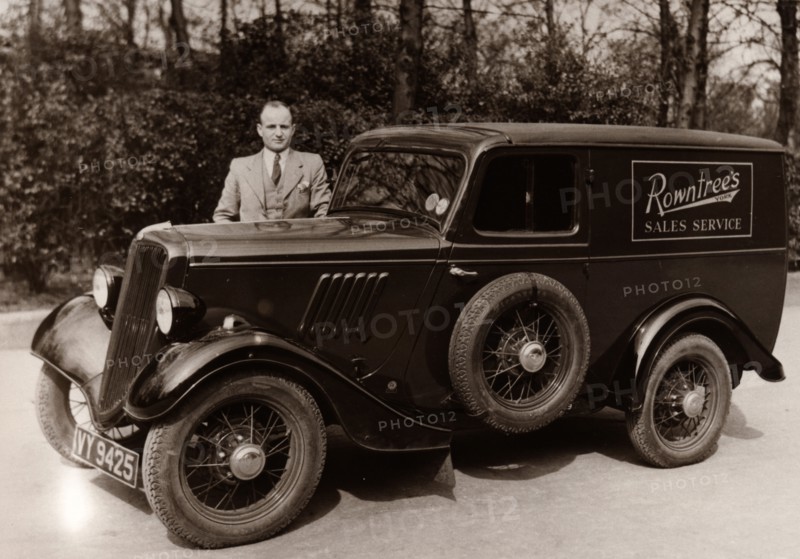 A Rowntree?s sales representative besides his car, York, Yorkshire,  1937. Artist: Unknown