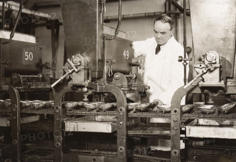 Easter egg moulding machine, Rowntree factory, York, Yorkshire, 1930. Artist: Unknown